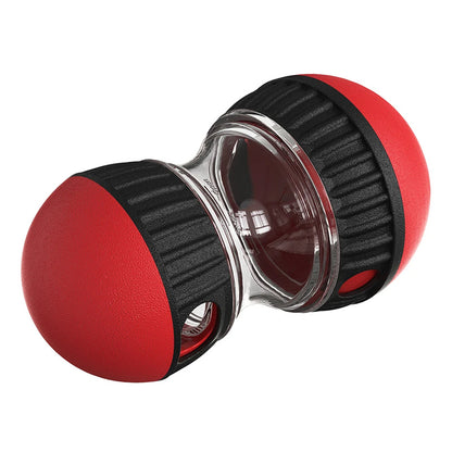 Red food dispensing dog toy tumbler at an angle